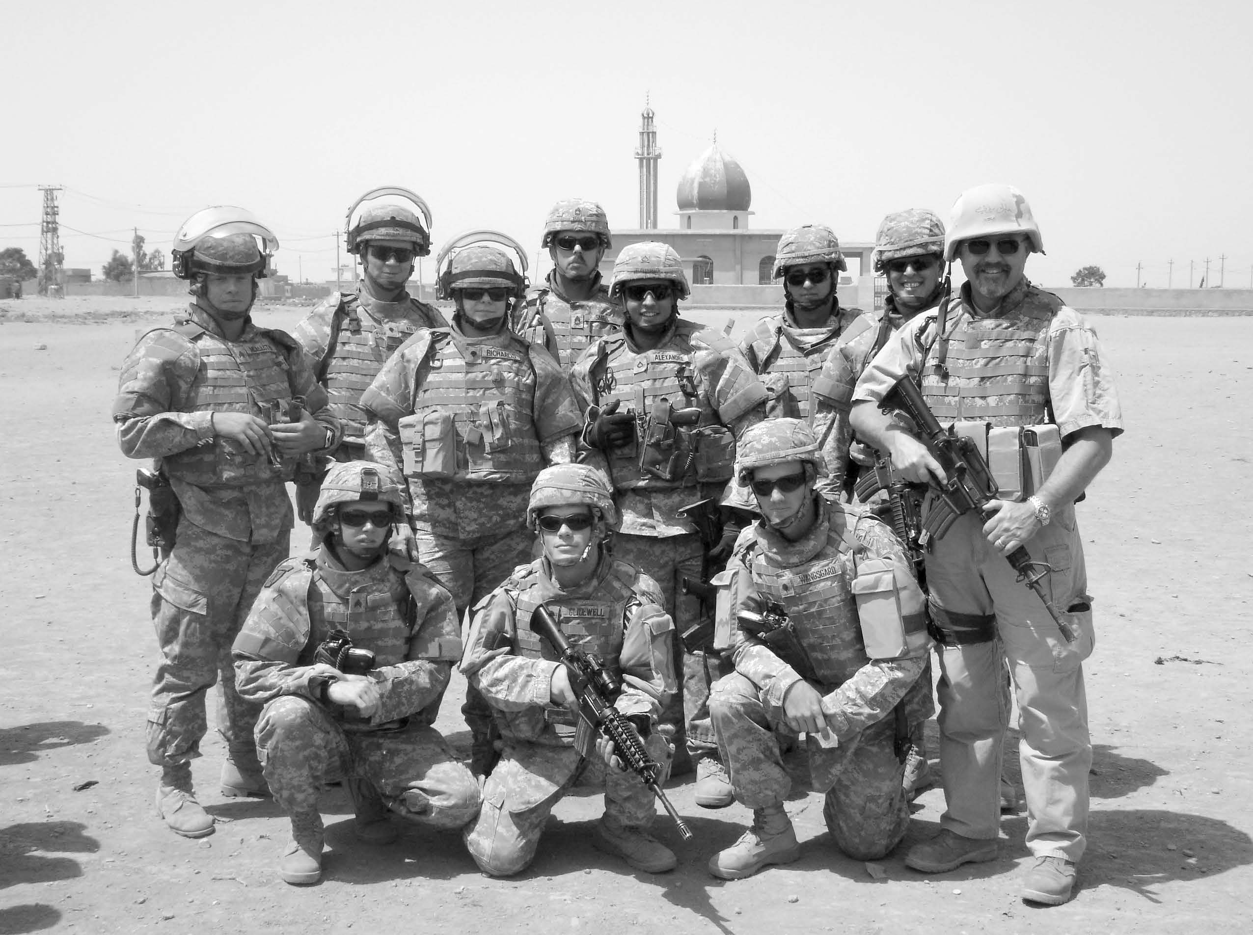 This picture, taken in summer 2006, shows Michael Beesley’s military police squad from the 511th Military Police, deployed from Fort Drum, New York, to Tal-Afar, Afghanistan. Courtesy of Marilynn Beesley.