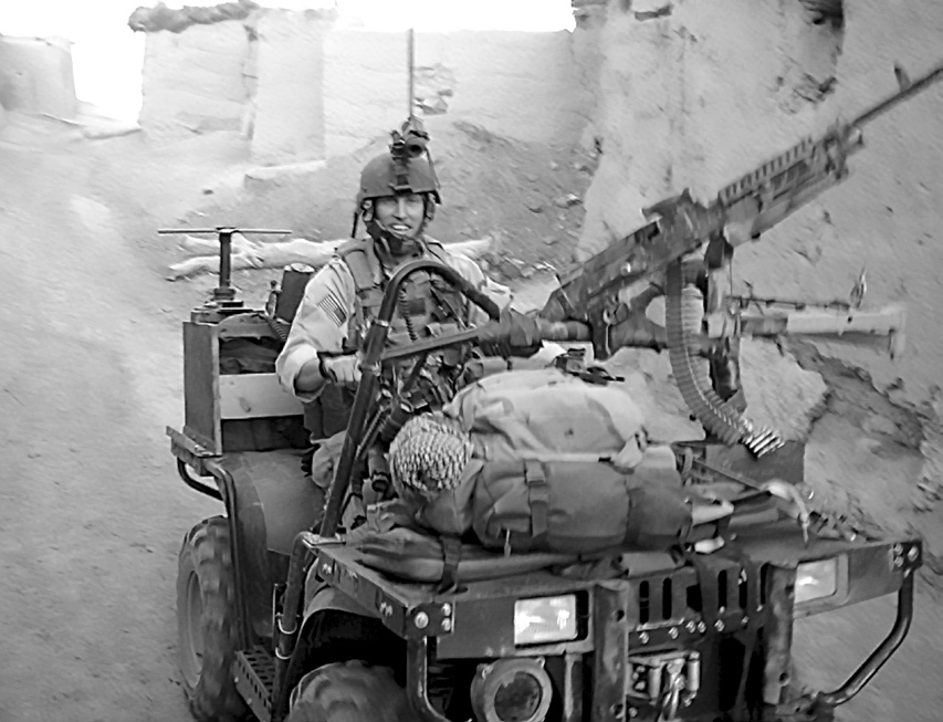 Captain Christopher O’Gwin operating a tactical all-terrain weapons vehicle during a raid on a village in southern Afghanistan in summer 2006. Courtesy of Christopher O’Gwin.