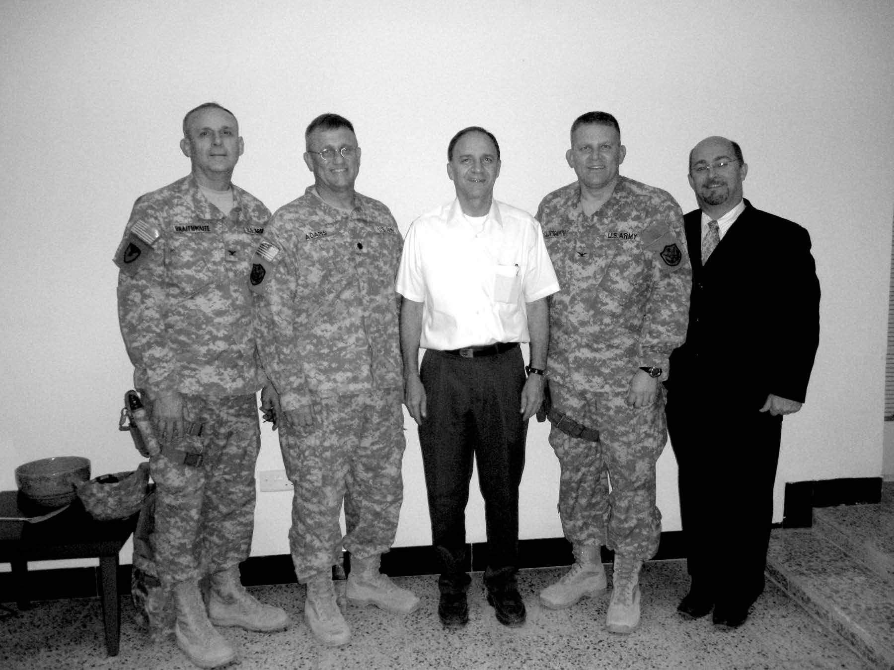The Baghdad Iraq Military District was organized by Elder Paul B. Pieper in November 2009. From left to right: Alan Braithwaite, executive secretary; Greg Adams, second counselor; Elder Paul B. Pieper, General Authority Seventy; Guy M. Hollingsworth, district president; and James Phipps, first counselor. Courtesy of Guy M. Hollingsworth.