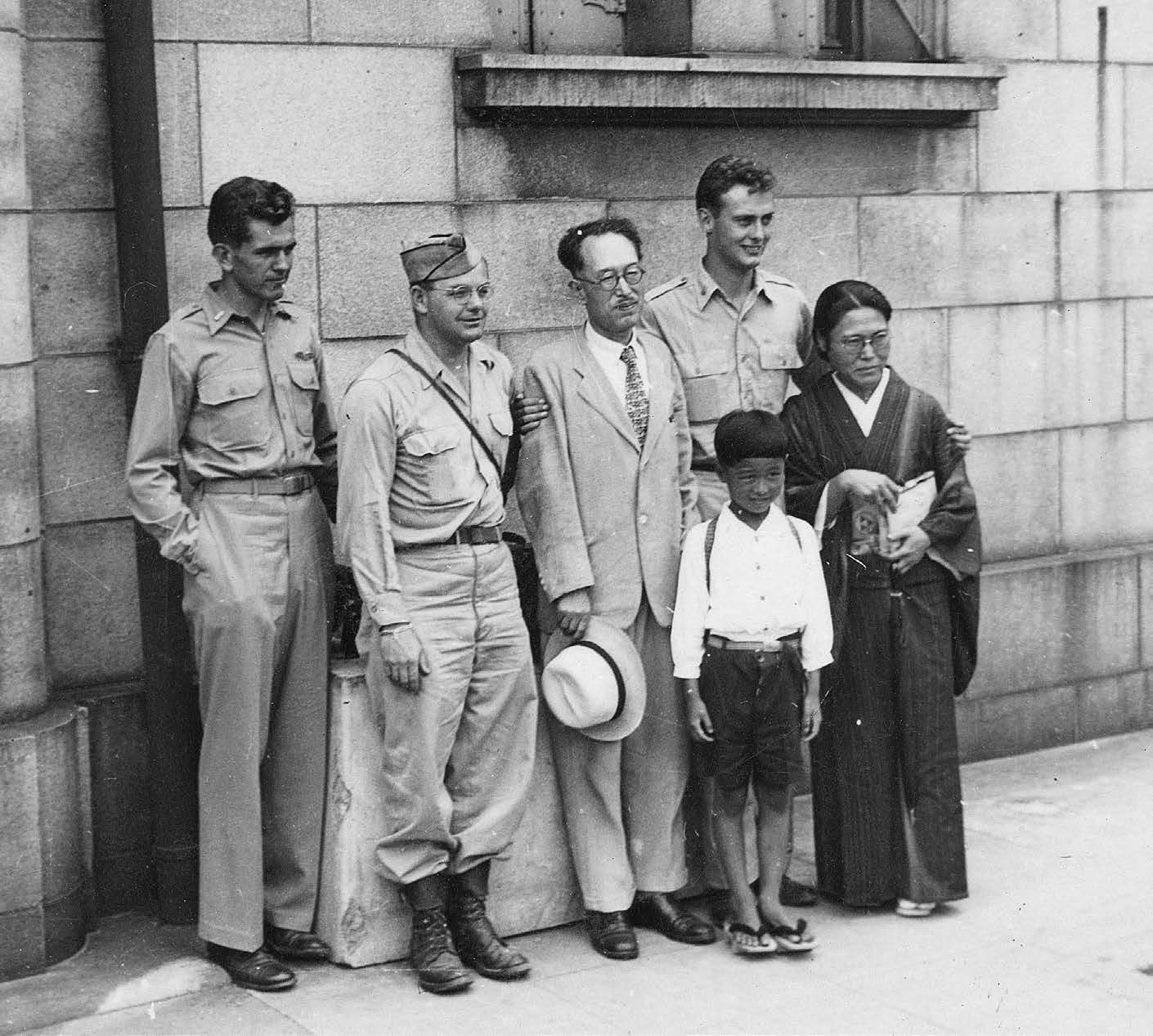 From left: Boyd K. Packer, Norman Nixon, Tatsui Sato, C. Elliott Richards, and Chiyo Sato with son Yasuo. The servicemen helped convert the Sato family, who were some of the first people to be baptized in Japan after World War II. Tatsui Sato would later translate the temple ceremony into Japanese. Photo courtesy of Chiyo Nelson Christensen.
