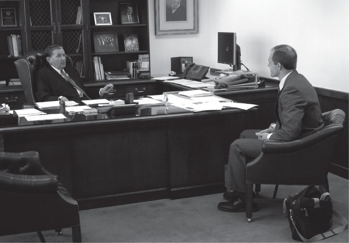 President Cecil O. Samuelson at his desk