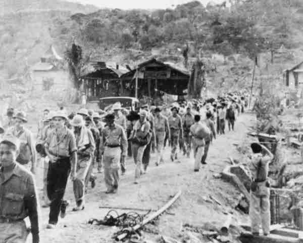 photo of american prisoners of war walking the bataan death march