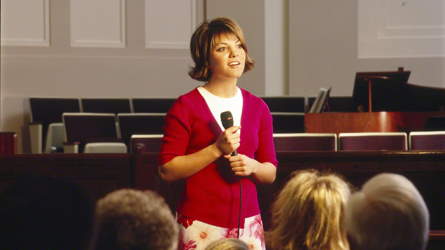 Young woman bearing testimony