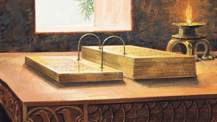 Drawing of the Book of Mormon plates on a table with an oil lamp