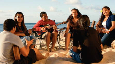 Polynesian youth playing on the beach