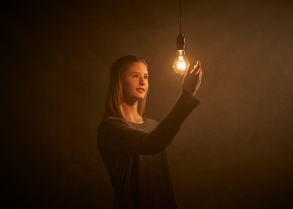 photo of a young woman choosing light over darkness