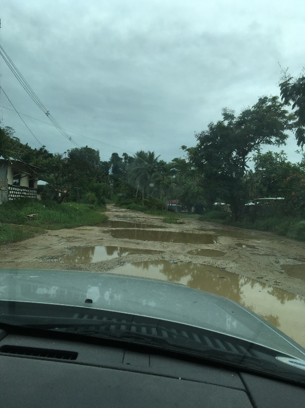 Chuuk road with potholes