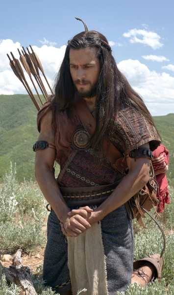 Enos praying in a field