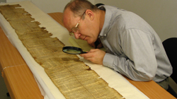 Donald W. Parry researching the Great Isaiah Scroll