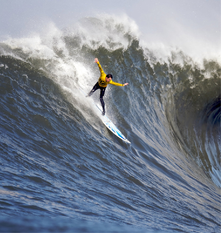 Surfer catching a wave