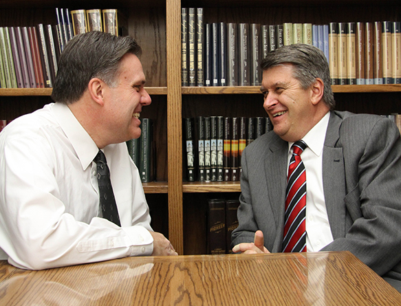 Brad Wilcox and Brent Top seated at a table, chatting