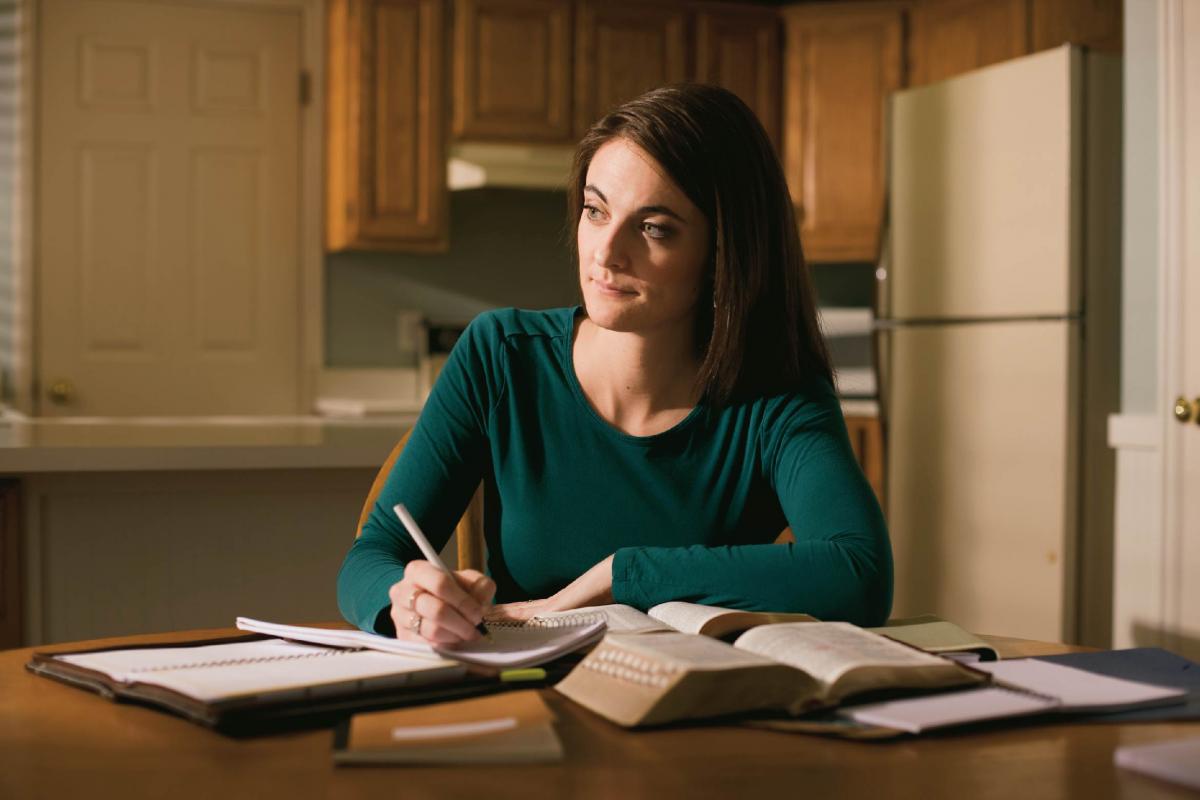 Woman studying the scriptures