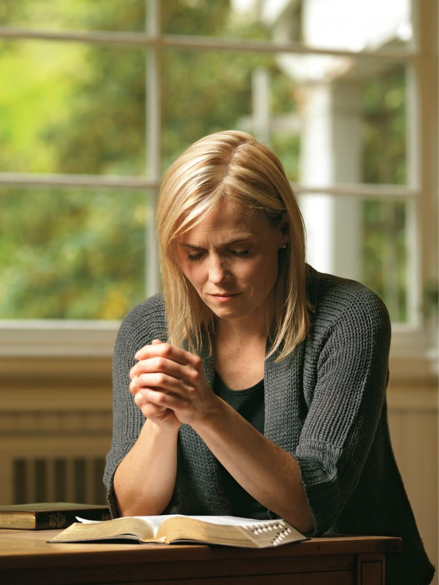 Woman studying the scriptures