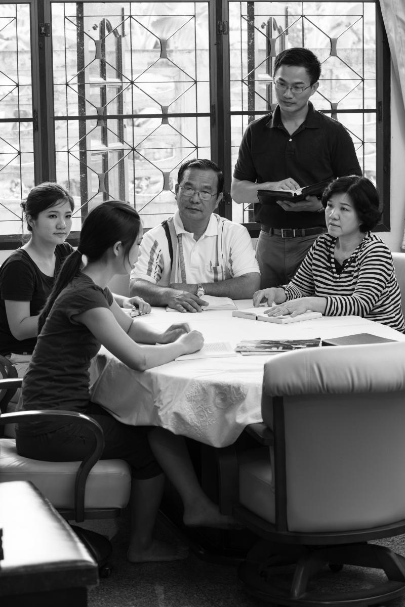 Family sitting around a table