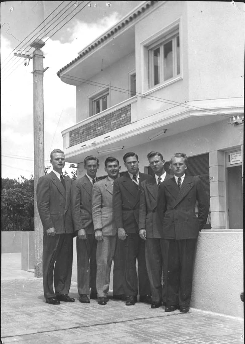 Missionaries standing in front of the Malvín Branch meetingplace: William N. Jones, Melvin Brady, Terry C. Smith, Kay W. Young, Cecil Millett, and Gerald Nielsen. Courtesy of CHL.
