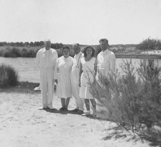 First convert baptism in Uruguay, fall 1948. Left to right: President Williams, Brother and Sister Rodriguez, Sister Diber Preciozi, and Elder Preston J. Bushman. Courtesy of CHL.