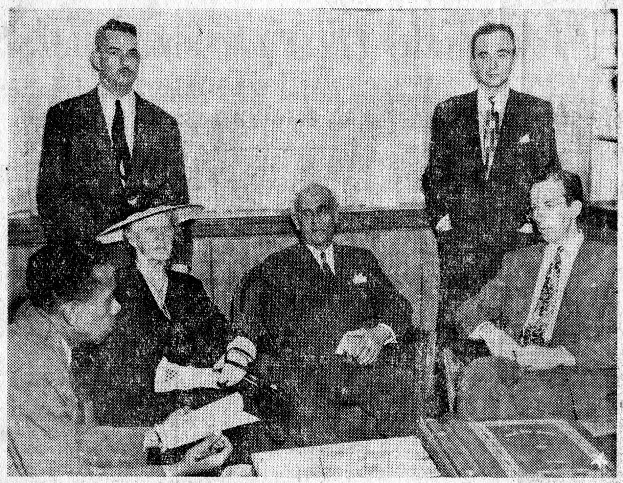 News clipping of the Richardses and President Rex visiting with a reporter. Courtesy of CHL.