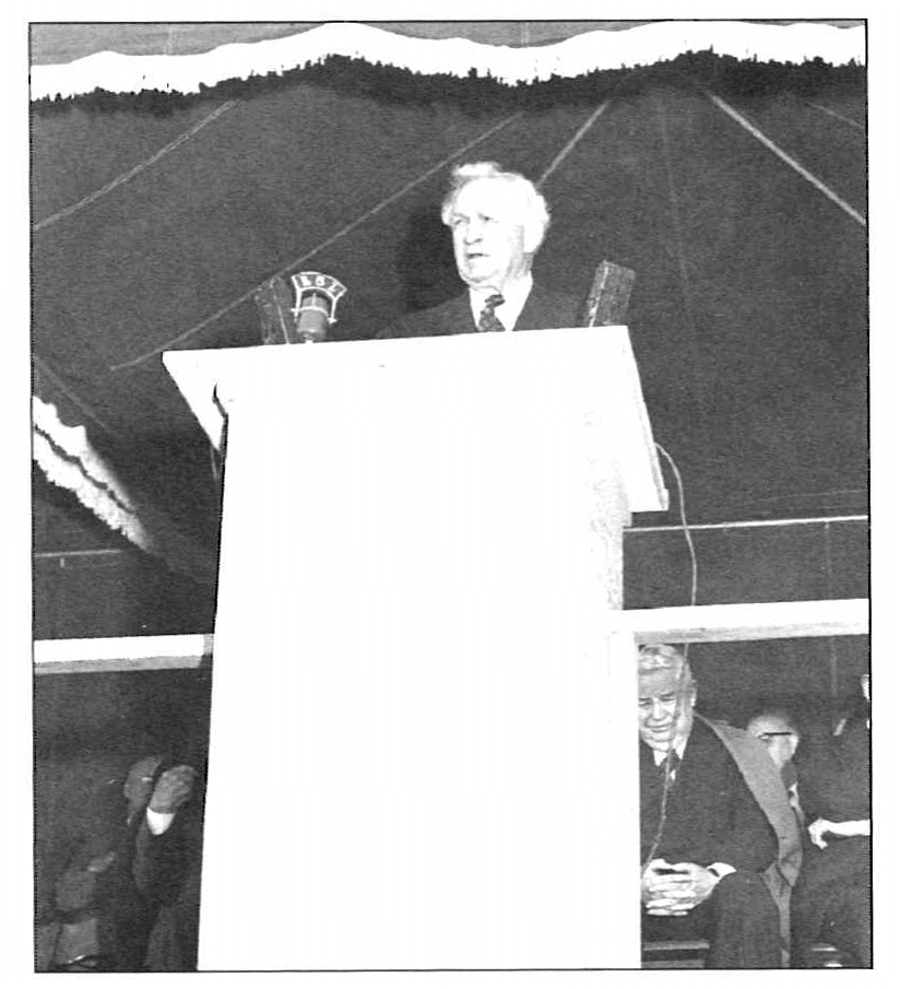 David O. McKay speaking at Los Angeles Temple cornerstone laying; to his left are his second counselor, J. Reuben Clark Jr., and Joseph Fielding Smith, president of the Twelve