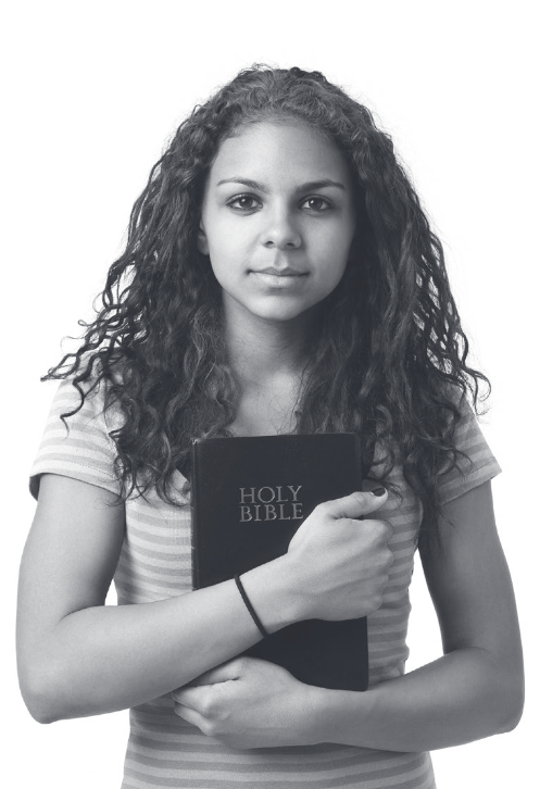 Woman holding a bible