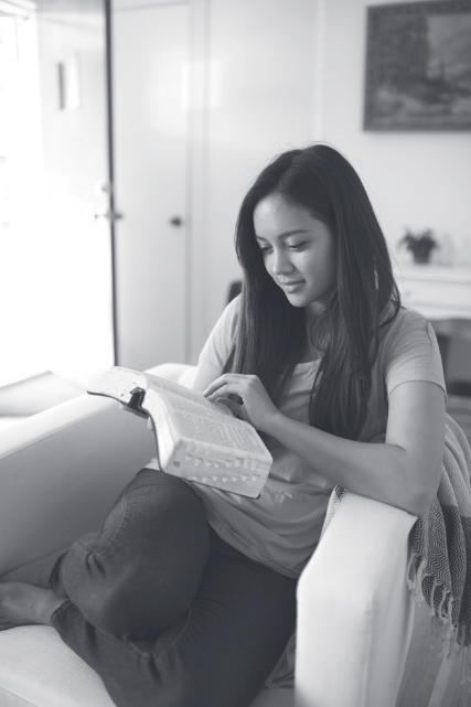 Woman studying the scriptures