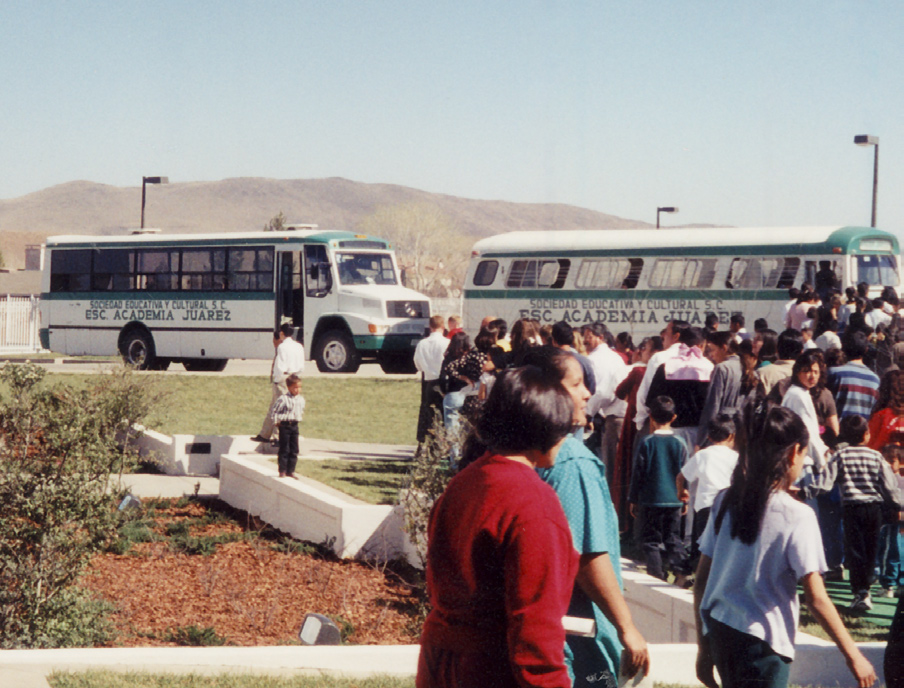 Academy buses take visitors from the stake center up to the temple.