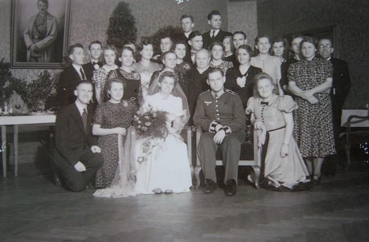 wedding with portrait of Hitler in the background
