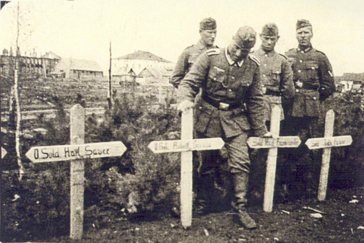 Four soldiers in graveyard