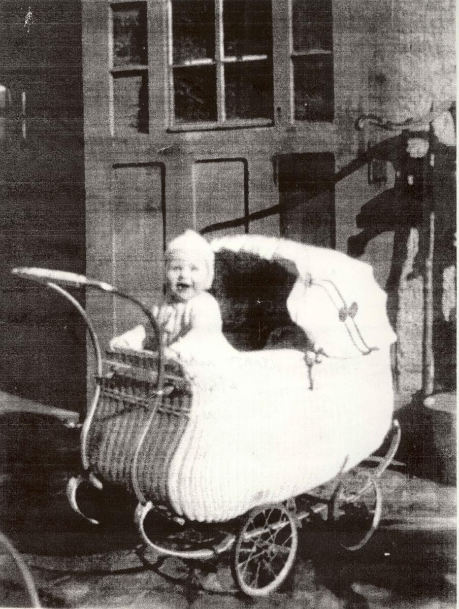 Little Renate Mudrow in her stroller