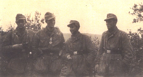 four men in uniform