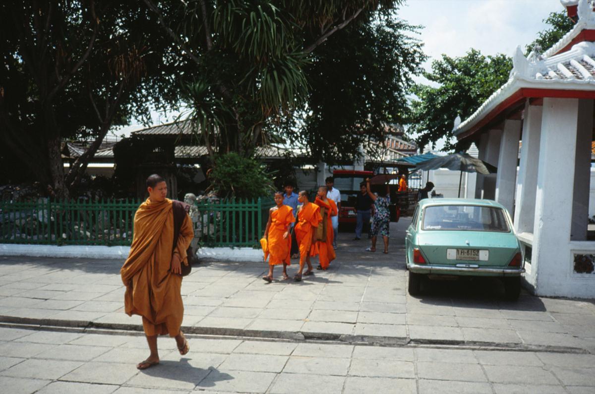 A monk and novices with shaved heads.