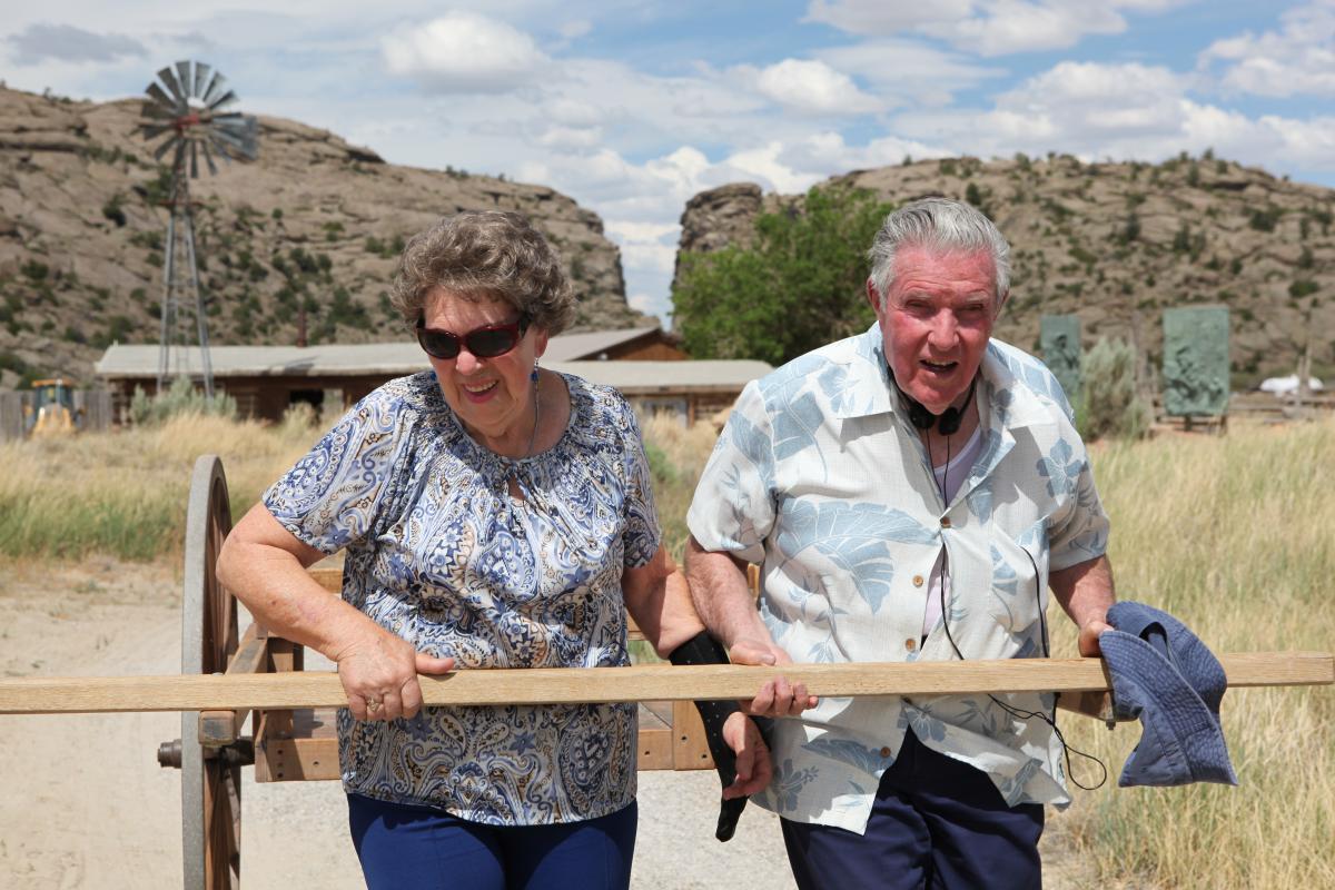 Richard and Dawn pulling a handcart