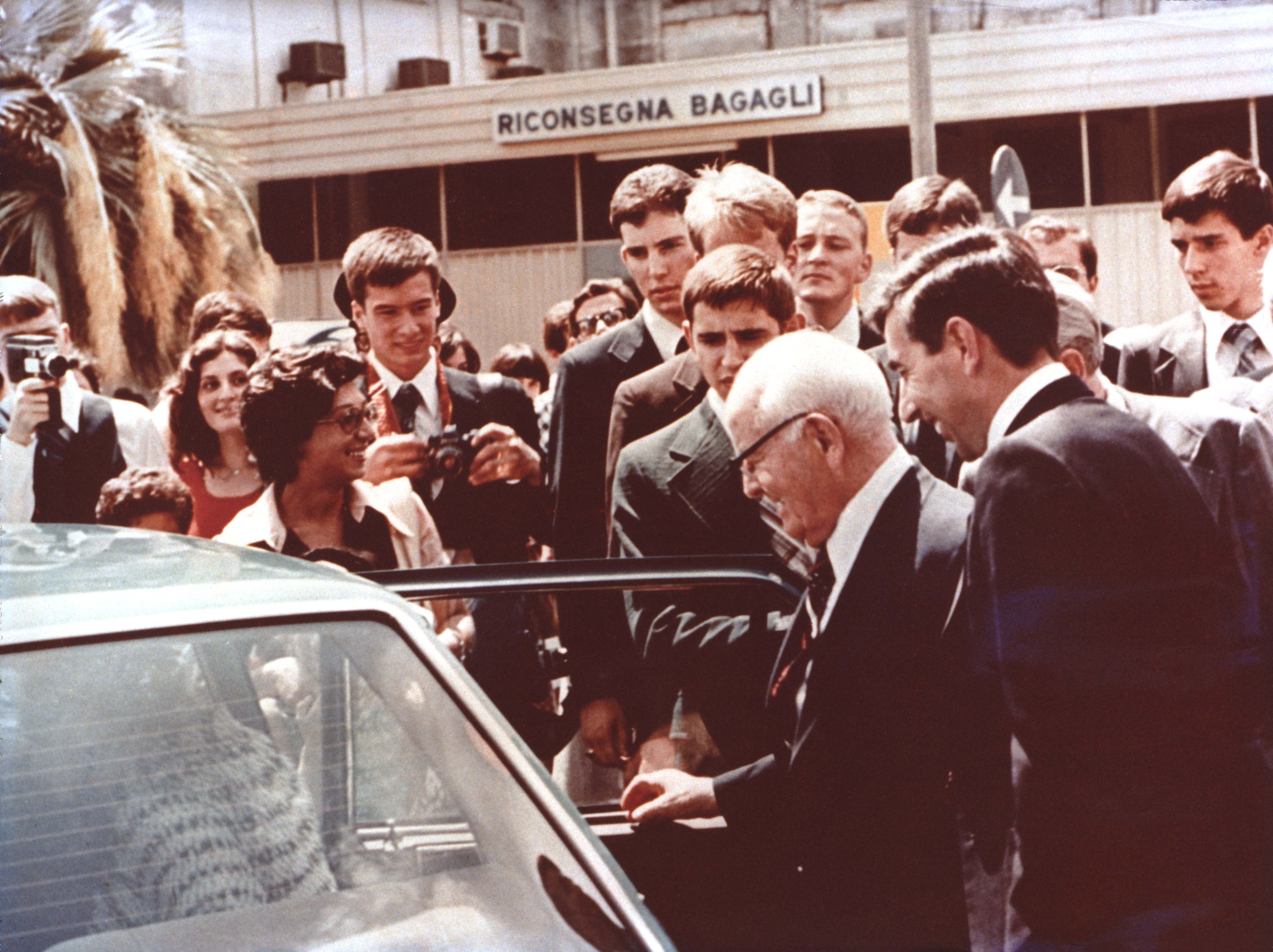 Spencer w kimbal getting out of a car