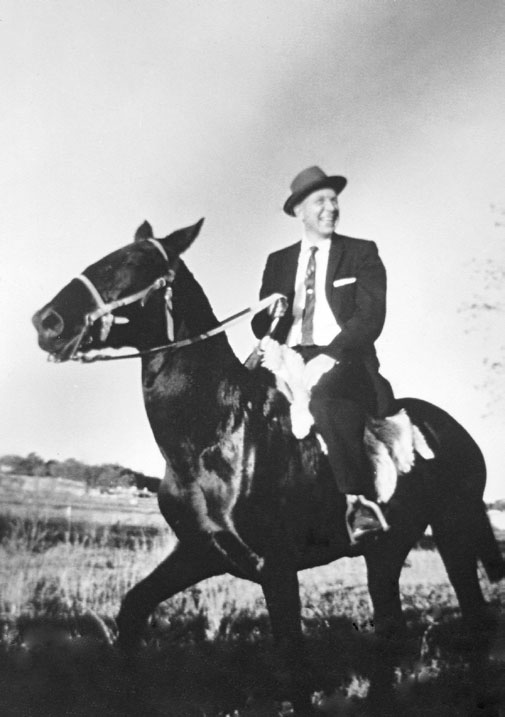 Elder Tuttle on his horse.