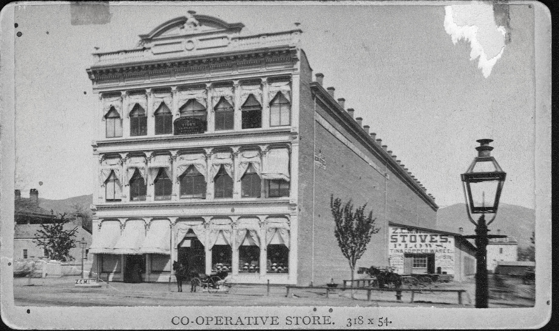 ZCMI flagship store in Salt Lake City circa 1878 before two additions tripled its frontage on Main Street. The original façade was successfully integrated into the new City Creek Center development in 2012. Courtesy of the Church History Library.