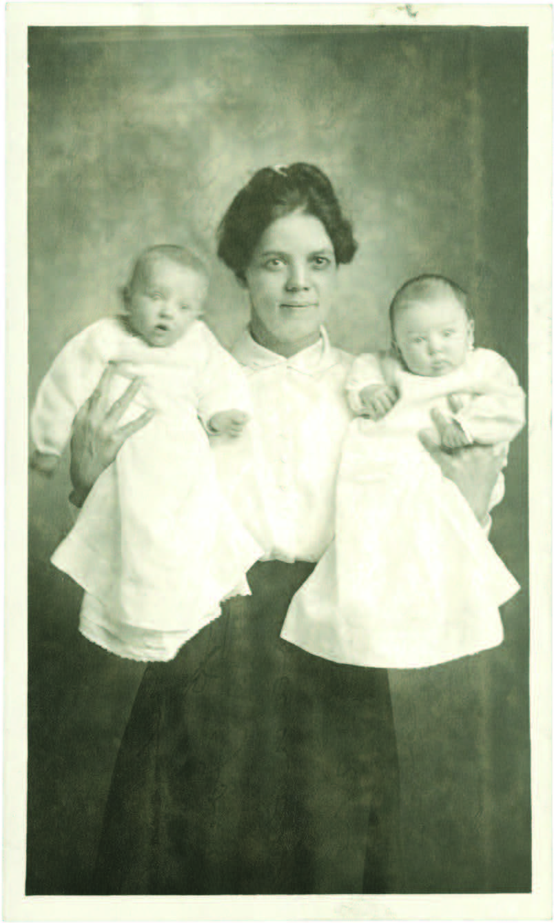 a woman and two babies