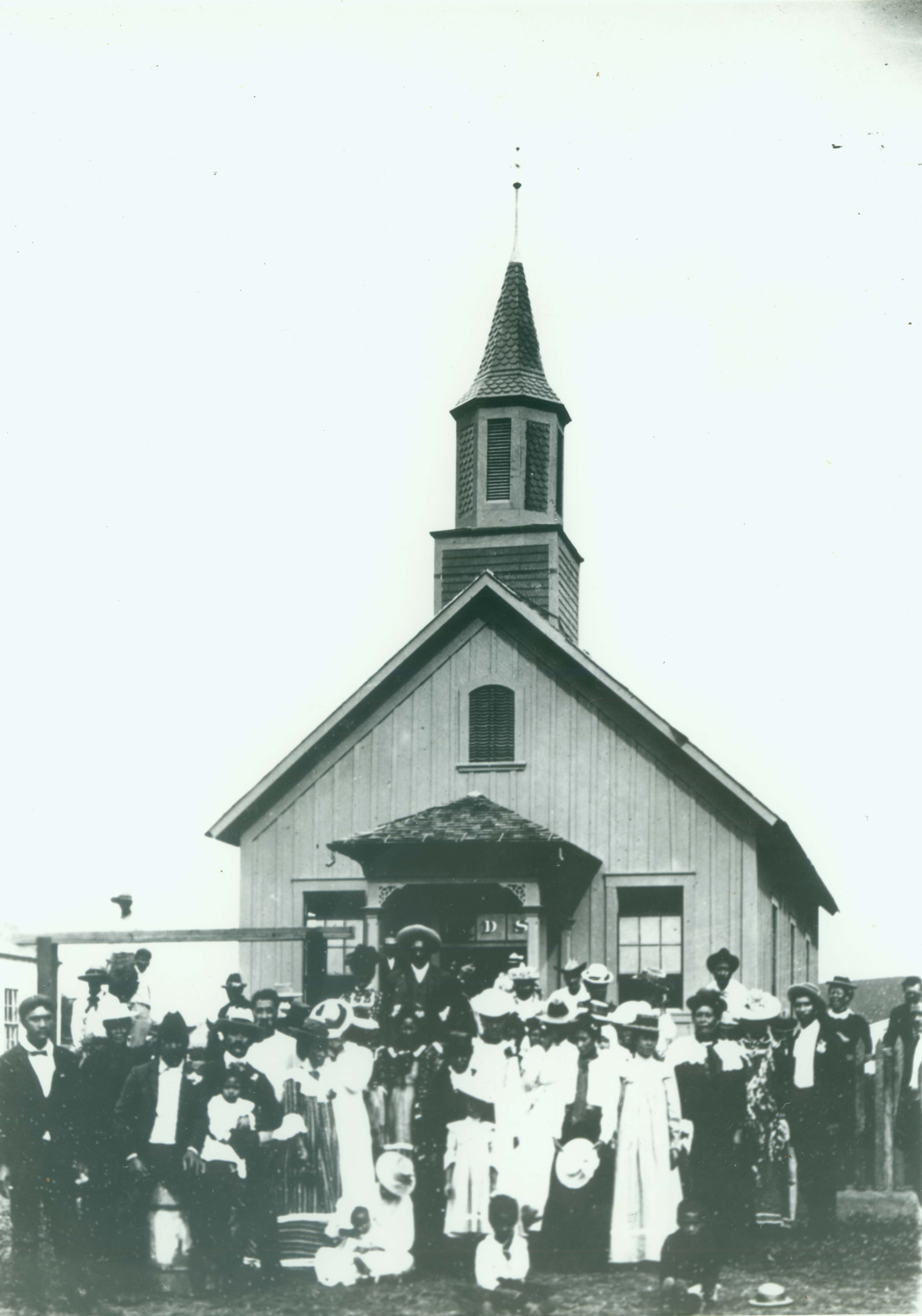 saints in front of church