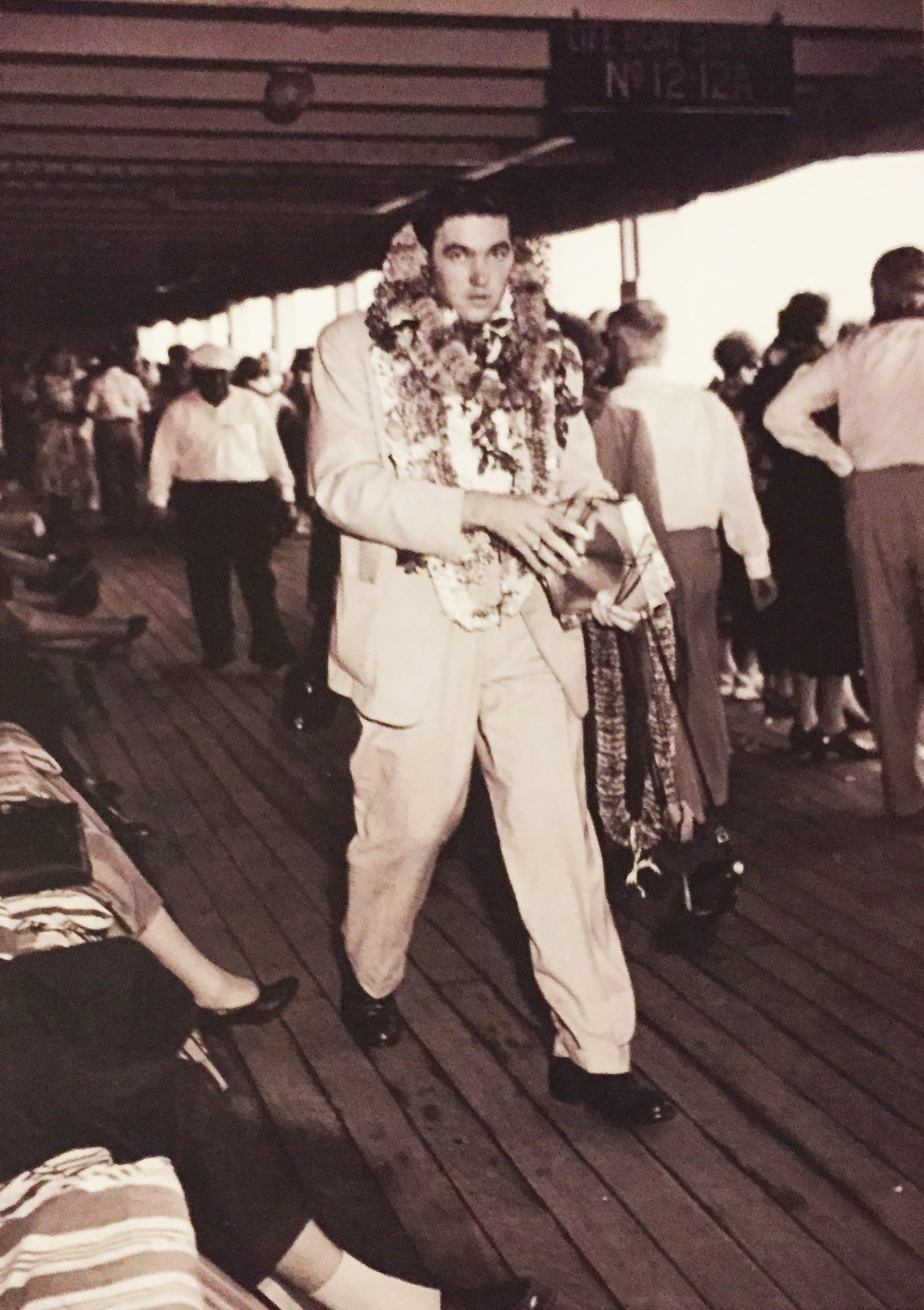 missionary with many leis