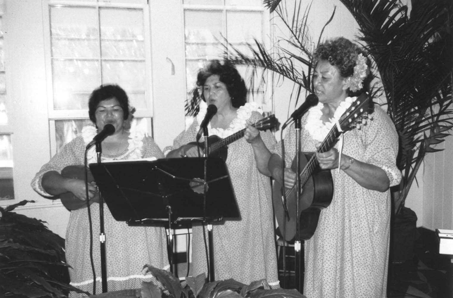 three women singing