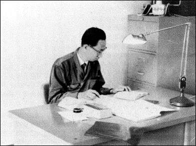 man working at a desk