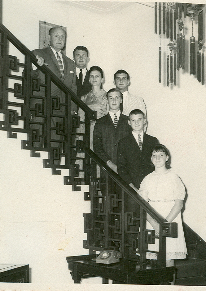 several people standing on stairs