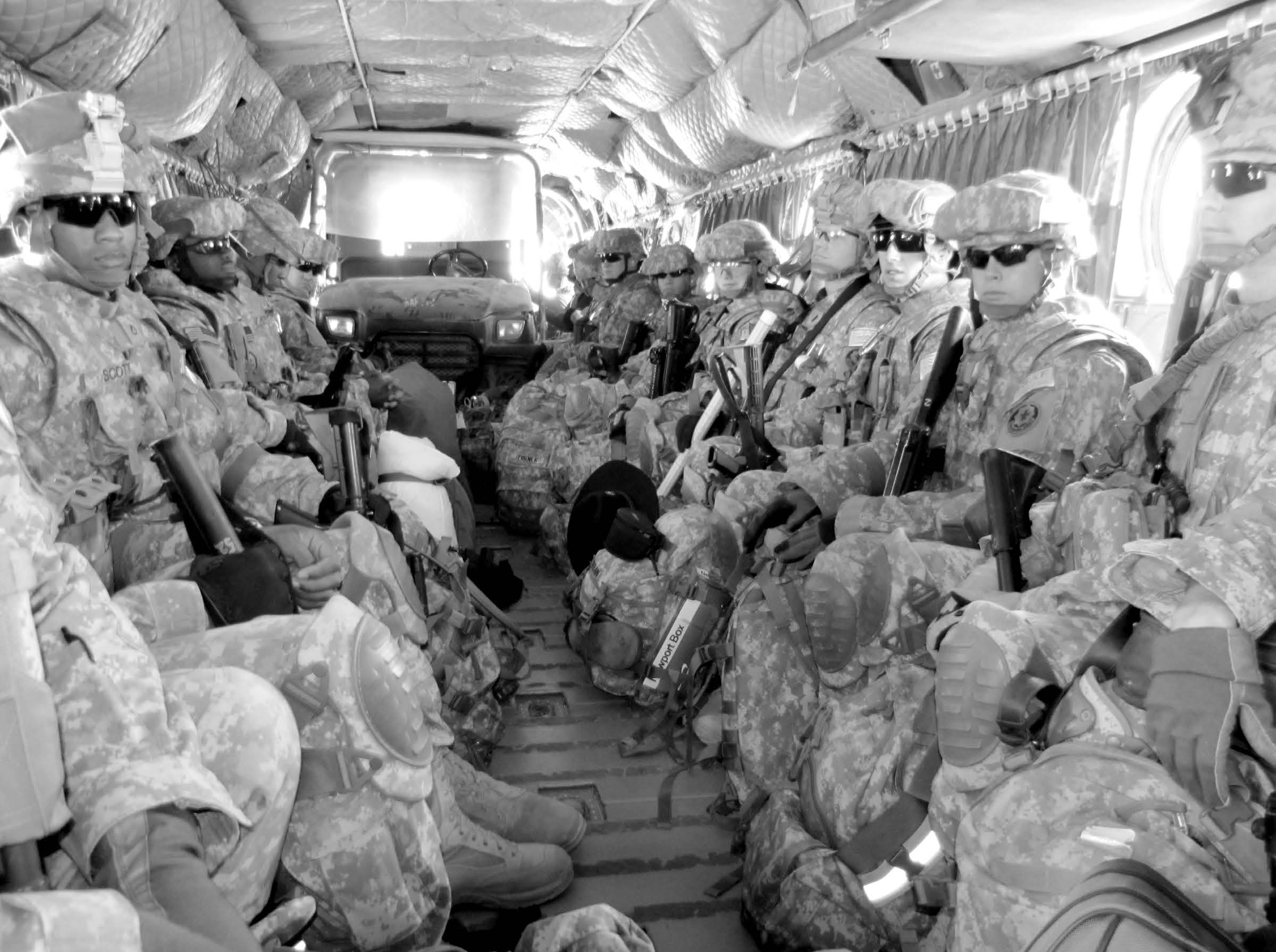 U.S. Army soldiers being transported in a CH-47 Chinook helicopter. Courtesy of J. Joseph DuWors.