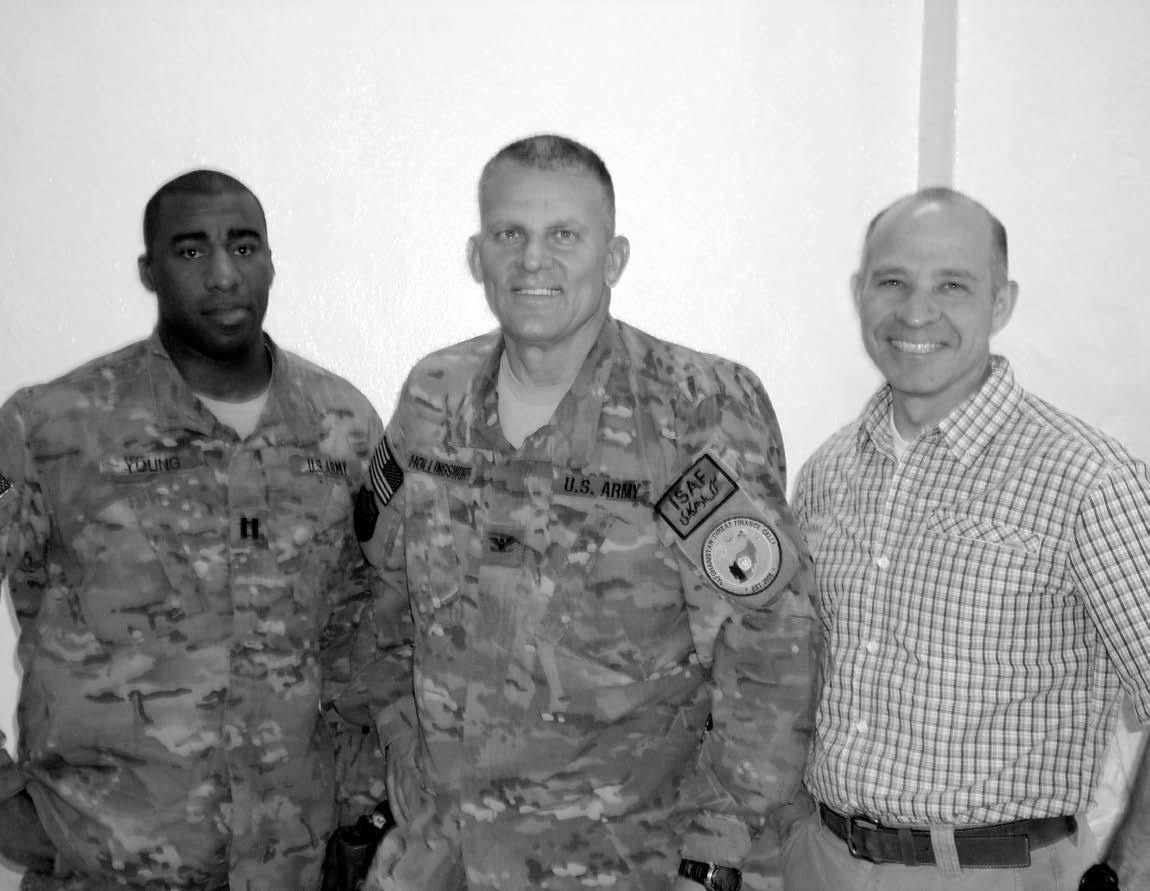 Members of the Bagram Afghanistan Branch in March 2014. Branch president Hollingsworth is leftmost on the second row. Courtesy of Guy M. Hollingsworth.