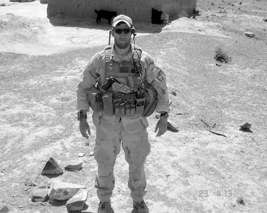 Captain Christopher O’Gwin outside a village in southern Afghanistan in spring 2006. His unit was conducting operations against suspected Taliban forces in the area. Courtesy of Christopher O’Gwin.