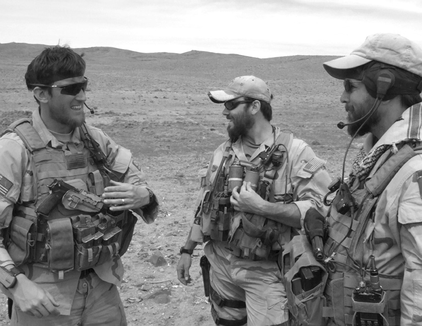 Captain Christopher O’Gwin (left), Senior Airman Joe Culbertson (center), and Chief Warrant Officer Dennis Guy taking a rest outside a small village in southern Afghanistan during April 2006. Courtesy of Christopher O’Gwin.