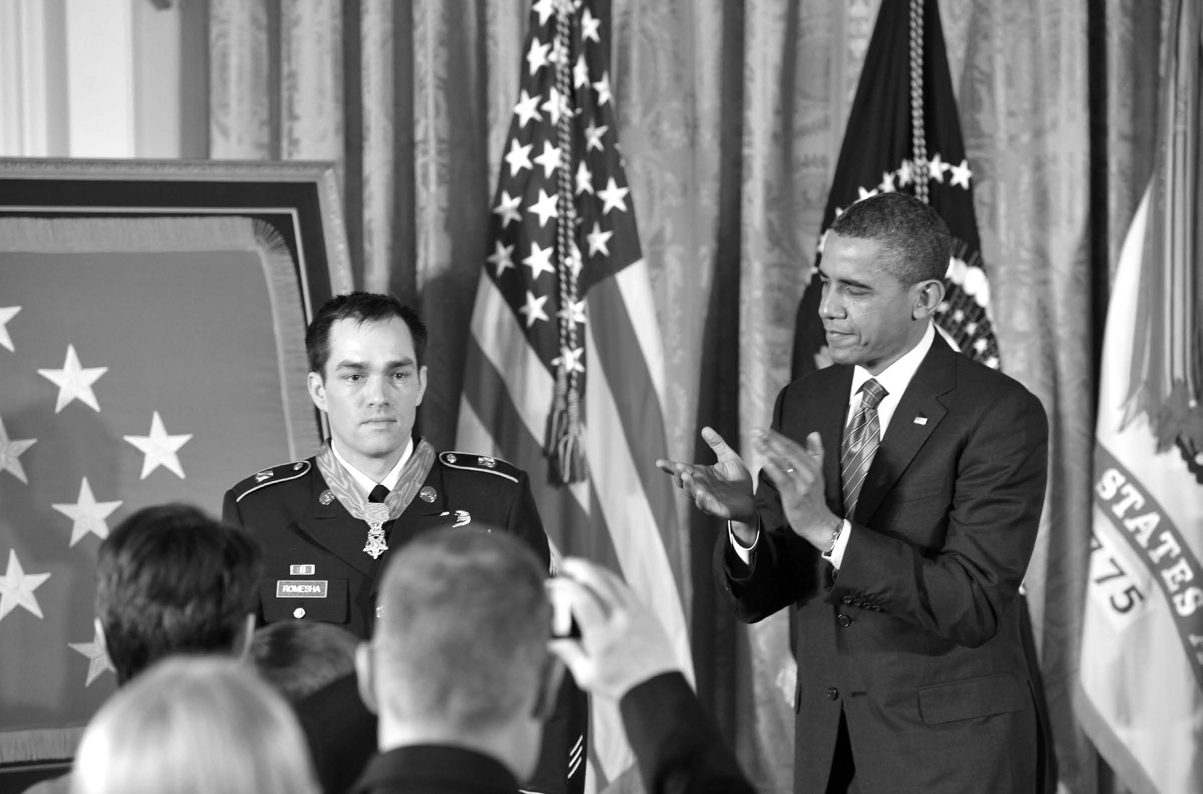 President Barack H. Obama awarded former Staff Sergeant Clinton Romesha the Medal of Honor for conspicuous gallantry in Afghanistan during a ceremony in the East Room of the White House on February 11, 2013. Courtesy of DoD.