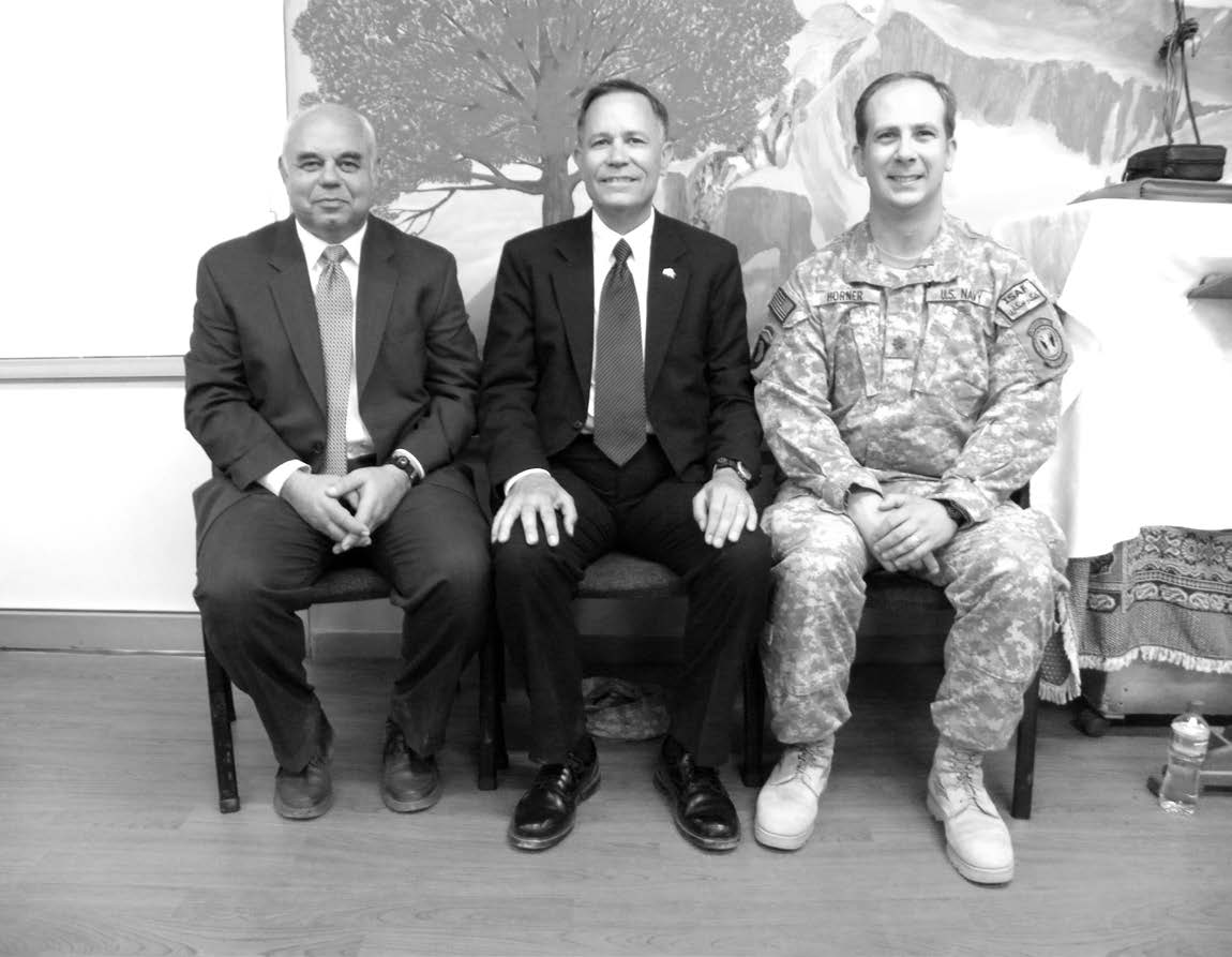 Kabul Afghanistan Military District presidency in 2009. Left to right: N. Winn Noyes, first counselor; Eugene J. Wikle, district president; and Robert L. Horner, second counselor. Courtesy of Eugene J. Wikle.