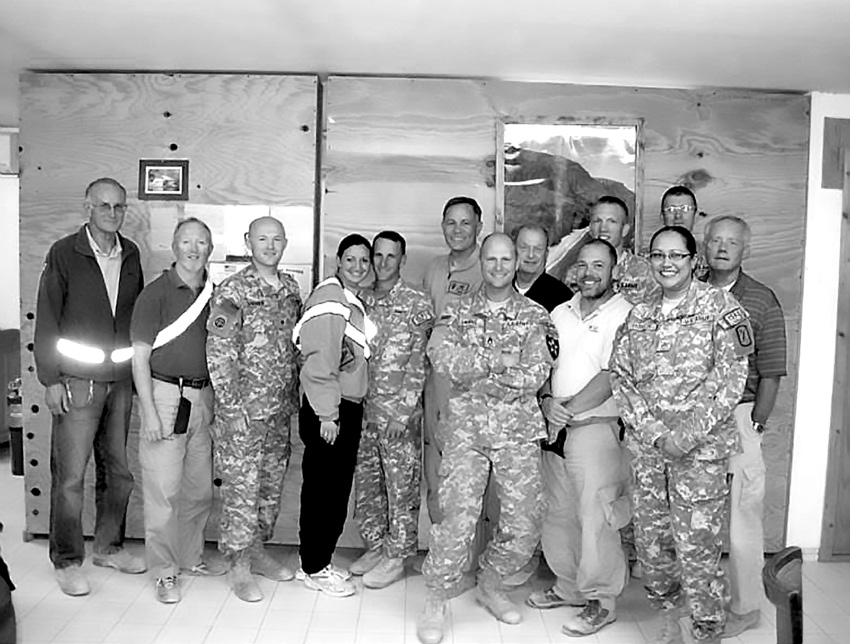 Members of the Kandahar Military Branch visiting with District President Gene Wikle (sixth from left) on October 18, 2009. Courtesy of Eugene J. Wikle.