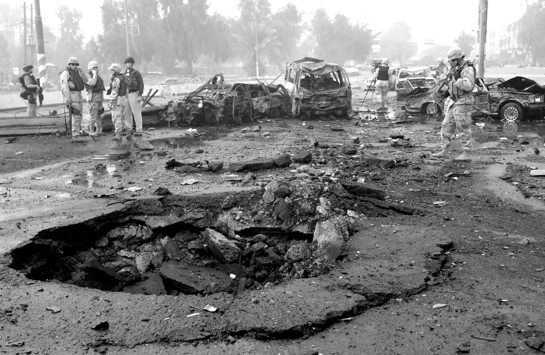 Several people were killed during a suspected car bombing outside Entrance 1 to the Coalition Provisional Authority on January 18, 2004, at 8:03 a.m. local time. The vehicle exploded in the middle of the intersection outside the gate, causing massive destruction. Courtesy of DoD.
