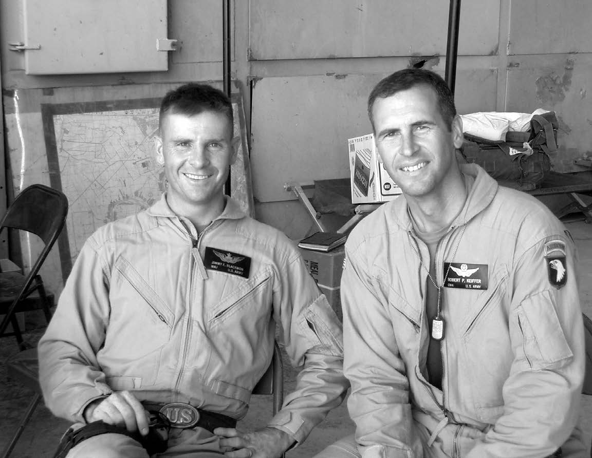 Major Jimmy Blackmon is shown relaxing with a fellow Army aviator. Courtesy of Jimmy F. Blackmon.