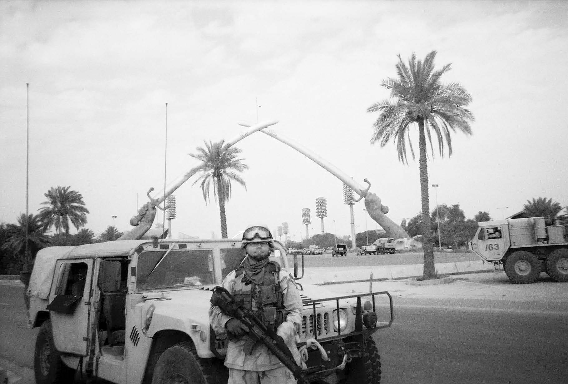 Bryan Blair is shown near the Crossed Sabers monument in Baghdad, Iraq. Courtesy of Bryan Blair.